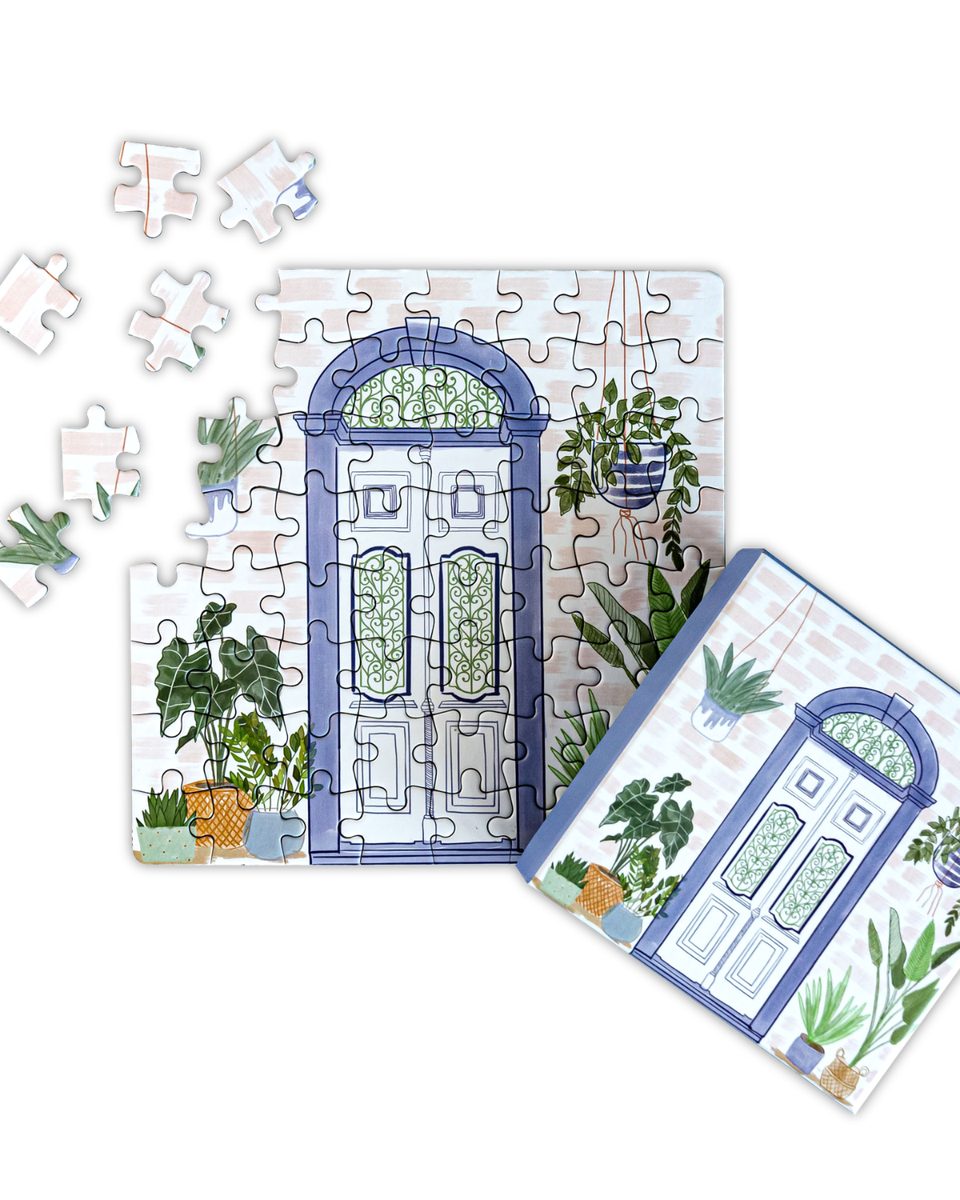 Purple door puzzle with its box