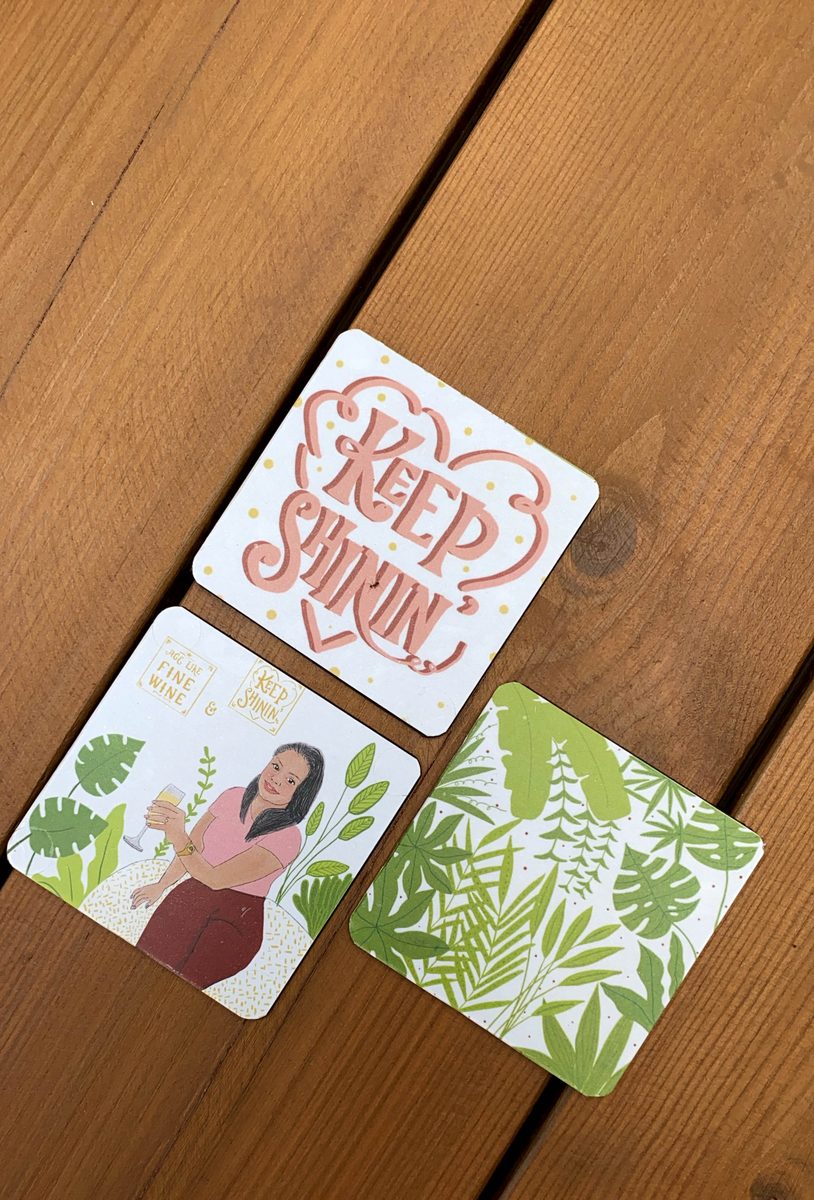 Illustrated coasters, including a hand-lettered one