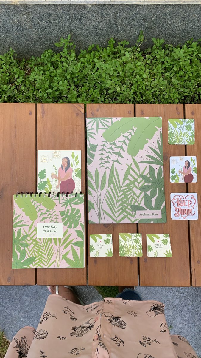 The illustration applied across notebook, calendar, cards and magnets